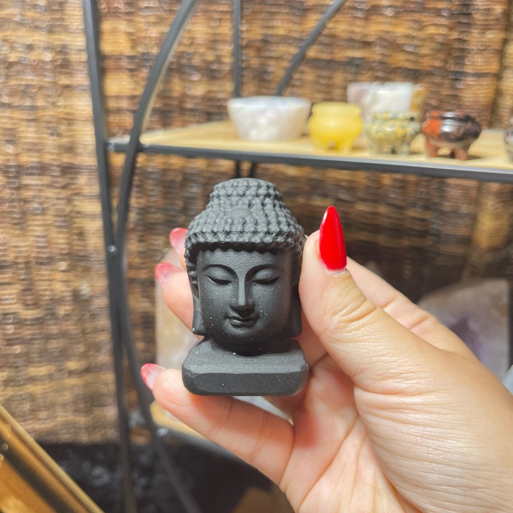 Black obsidian Buddha head carving